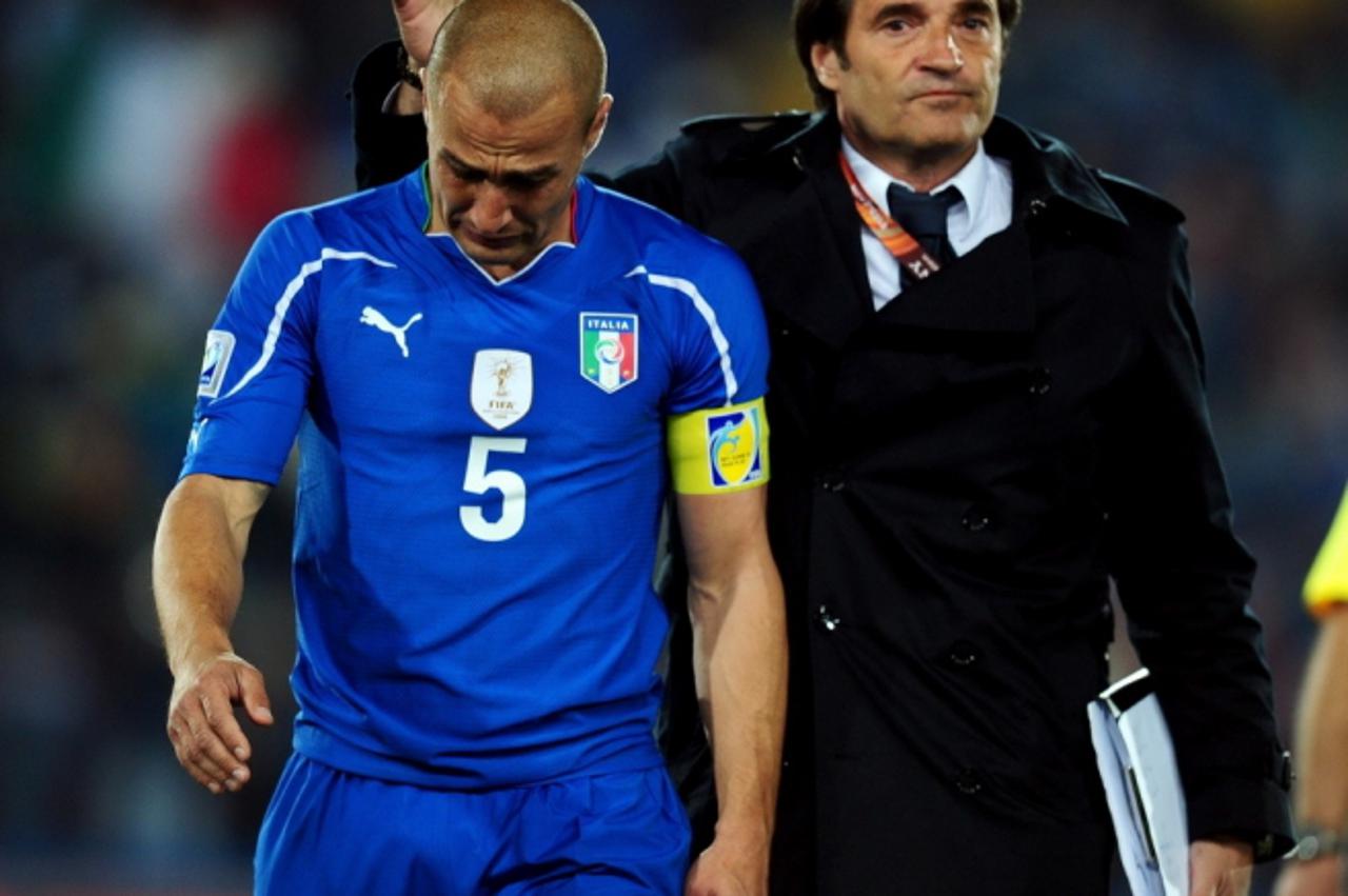 'JOHANNESBURG, SOUTH AFRICA - JUNE 24:  Fabio Cannavaro of Italy is dejected after the 2010 FIFA World Cup South Africa Group F match between Slovakia and Italy at Ellis Park Stadium on June 24, 2010 