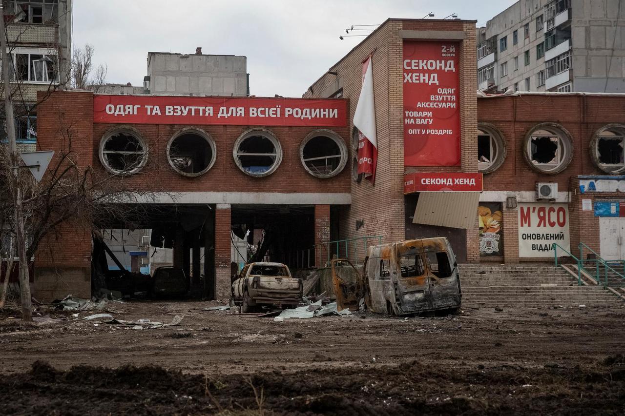 A general view shows an empty street and buildings damaged by a Russian military strike in Bakhmut