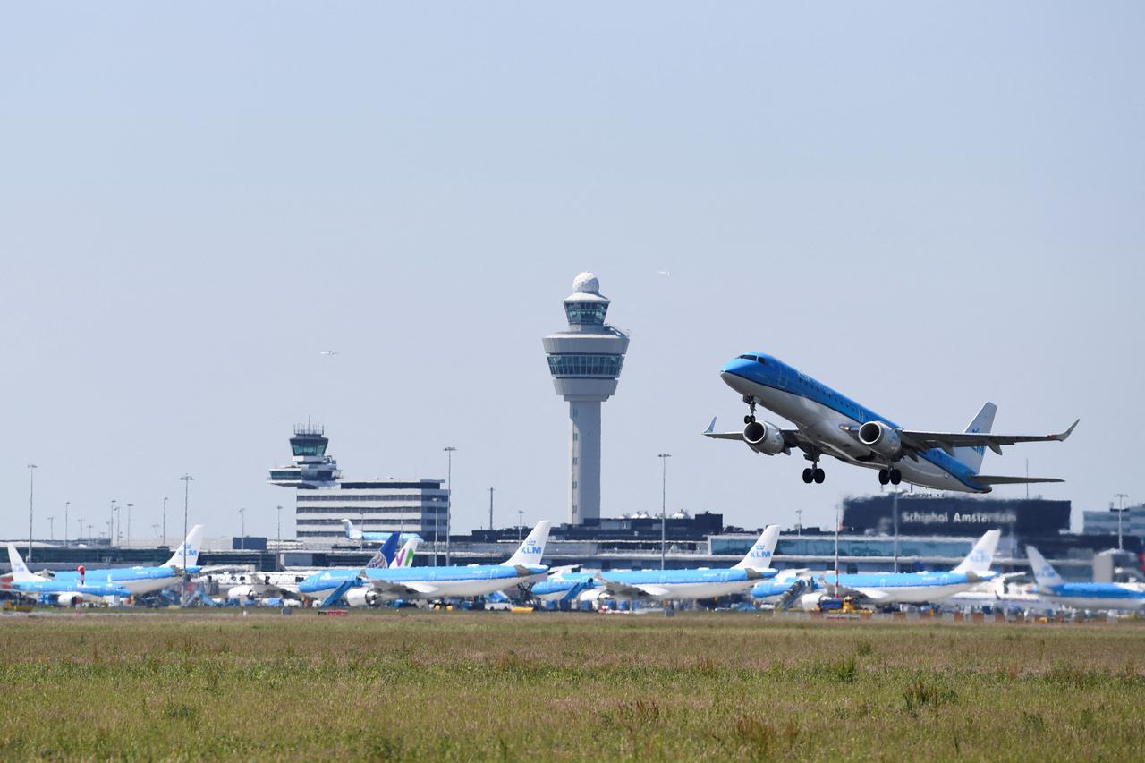 FILE PHOTO: An airplane takes off from Schiphol Airport in Amsterdam