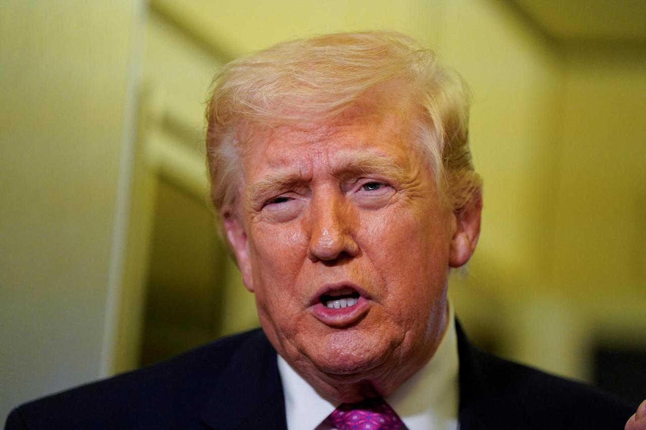 U.S. President Donald Trump on board Air Force One for travel to Joint Base Andrews