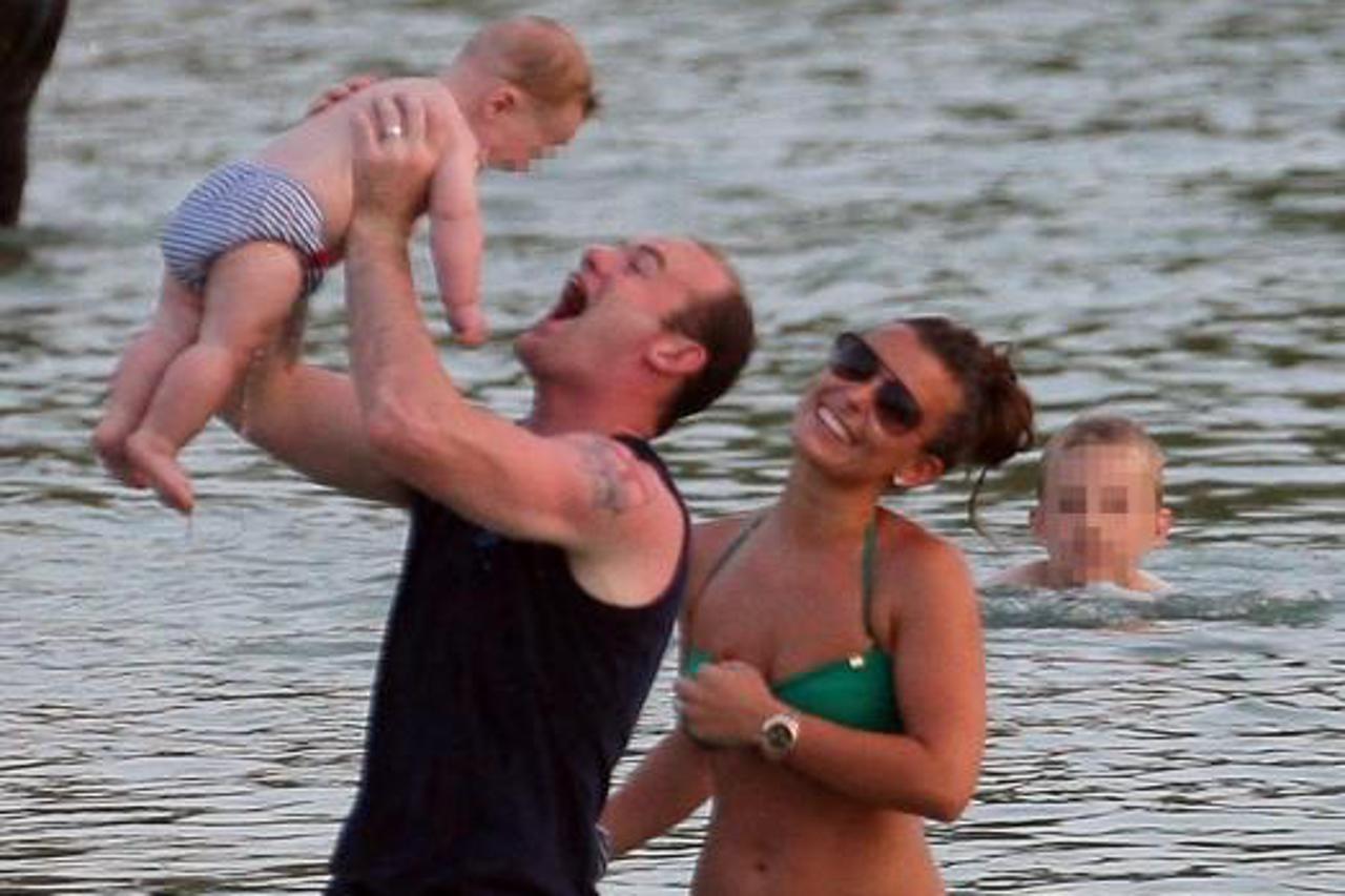 'WORLD RIGHTS  Footballer Wayne Rooney and his wife Coleen Rooney are seen enjoying their holidays with baby son Kai in the Caribbean. 06/07/2010  BYLINE JAMES JENKINS/BIGPICTURESPHOTO.COM: 001/JWJ  U