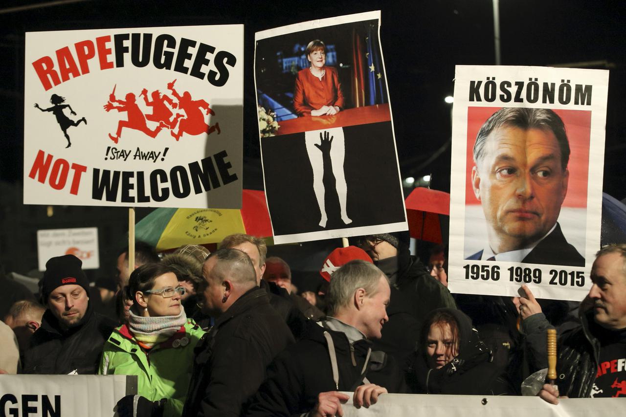 Members of LEGIDA, the Leipzig arm of the anti-Islam movement Patriotic Europeans Against the Islamisation of the West (PEGIDA), take part in a rally in Leipzig, Germany January 11, 2016.     REUTERS/Fabrizio Bensch TEMPLATE OUT