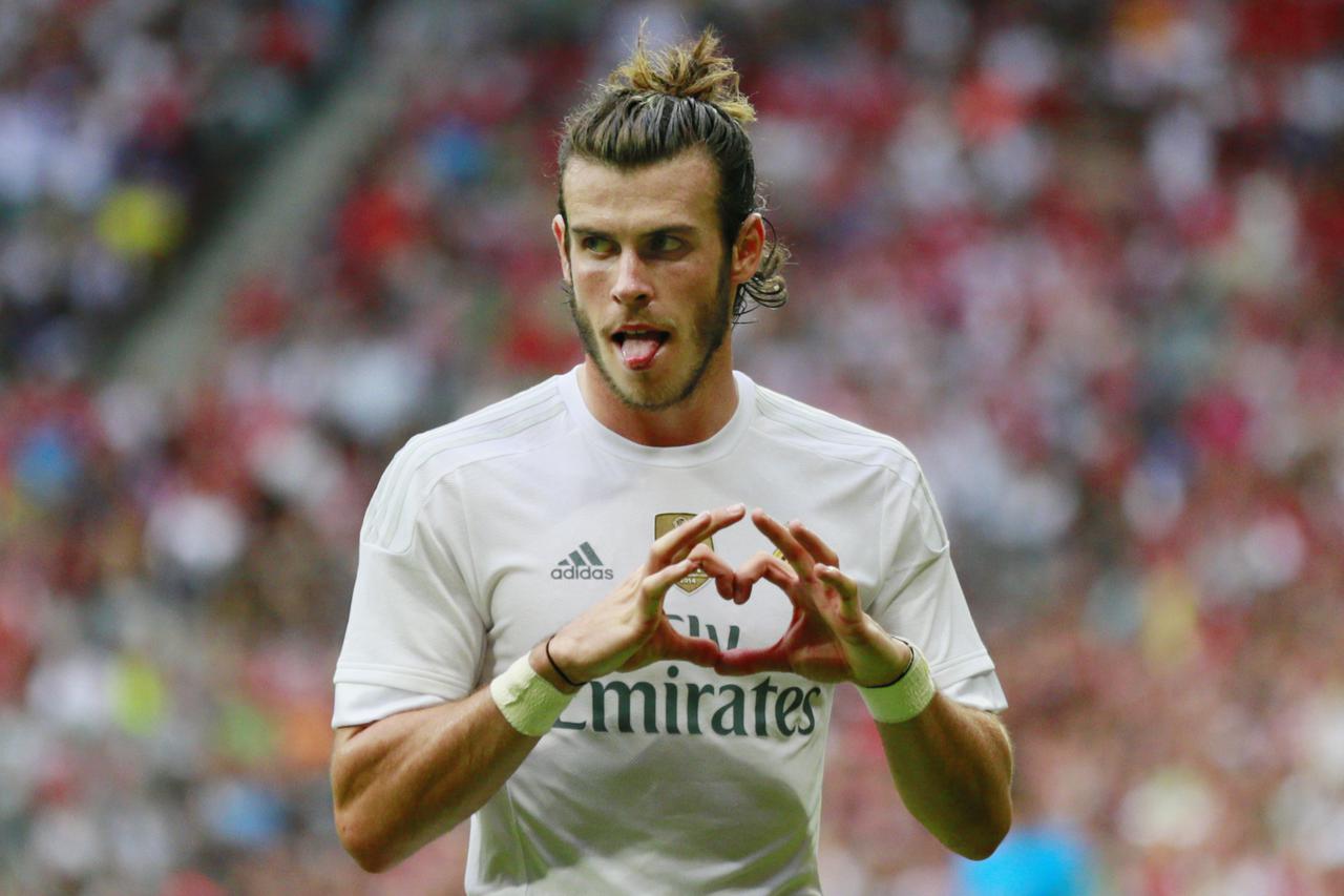 Football - Real Madrid v Tottenham Hotspur - Audi Cup Semi Final - Pre Season Friendly Tournament - Allianz Arena, Munich, Germany - 4/8/15 Gareth Bale celebrates after scoring the second goal for Real Madrid Action Images via Reuters / Jason Cairnduff Li