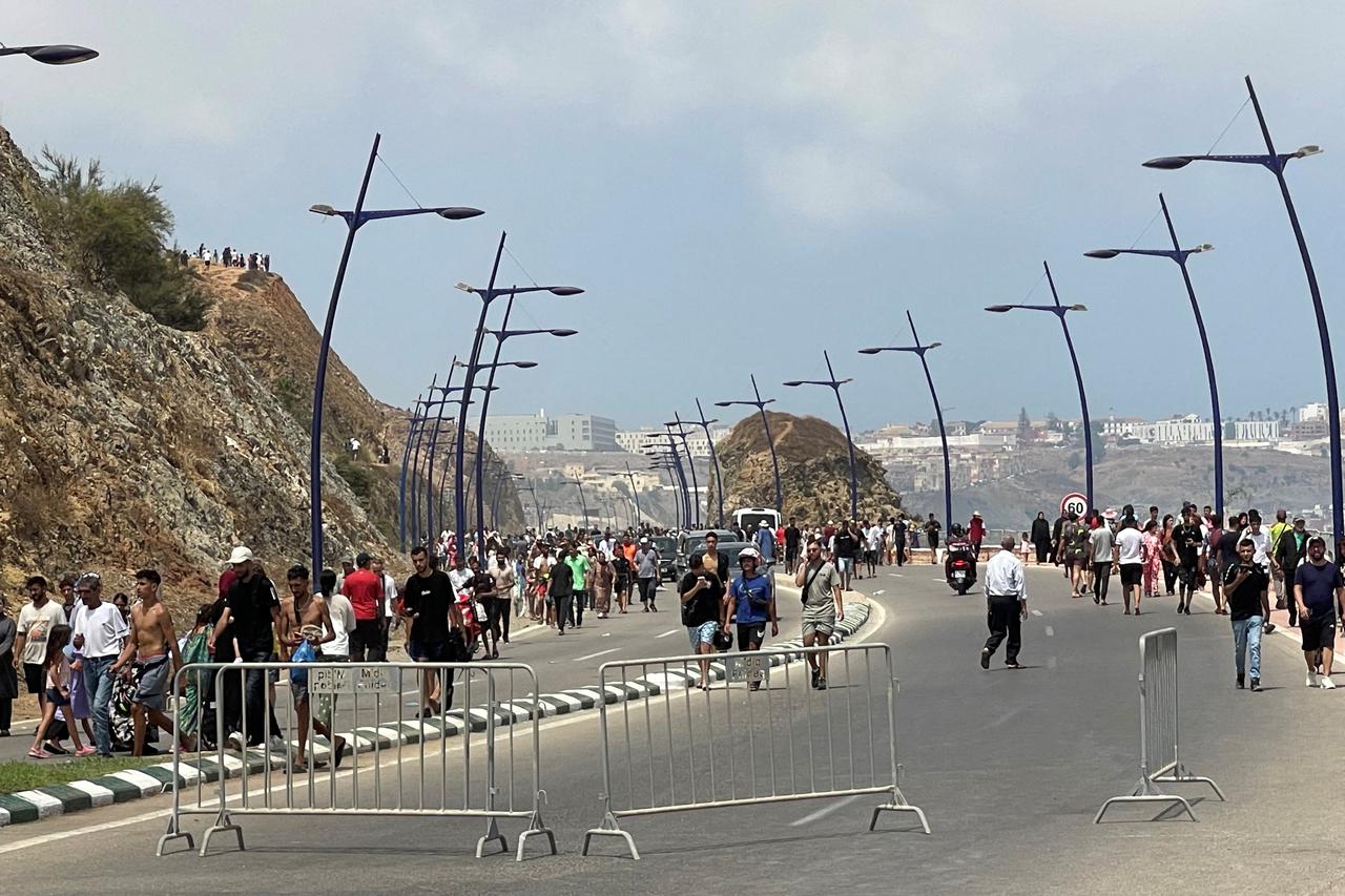 Migrants cross on foot into North African enclave of Ceuta from Morocco