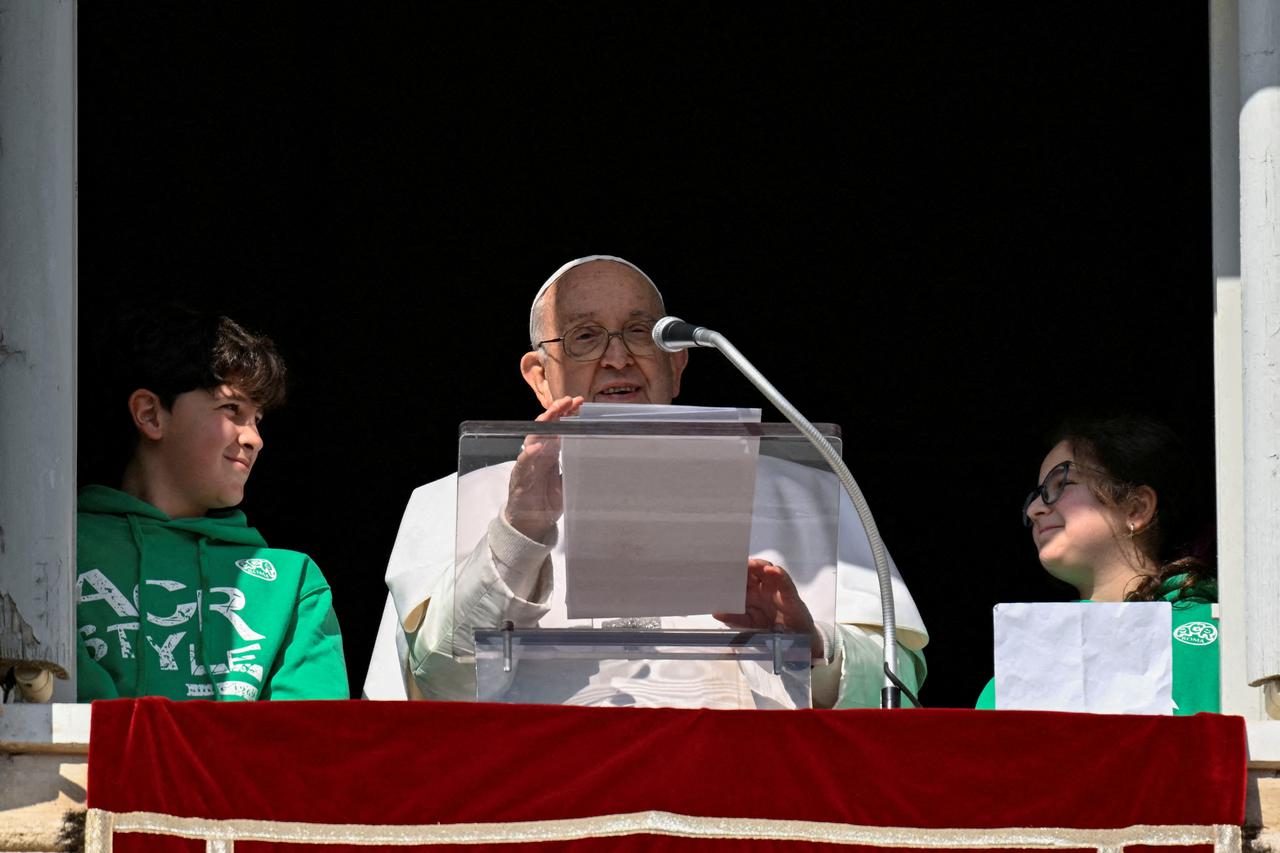 FILE PHOTO: Pope Francis leads Angelus prayer at Vatican