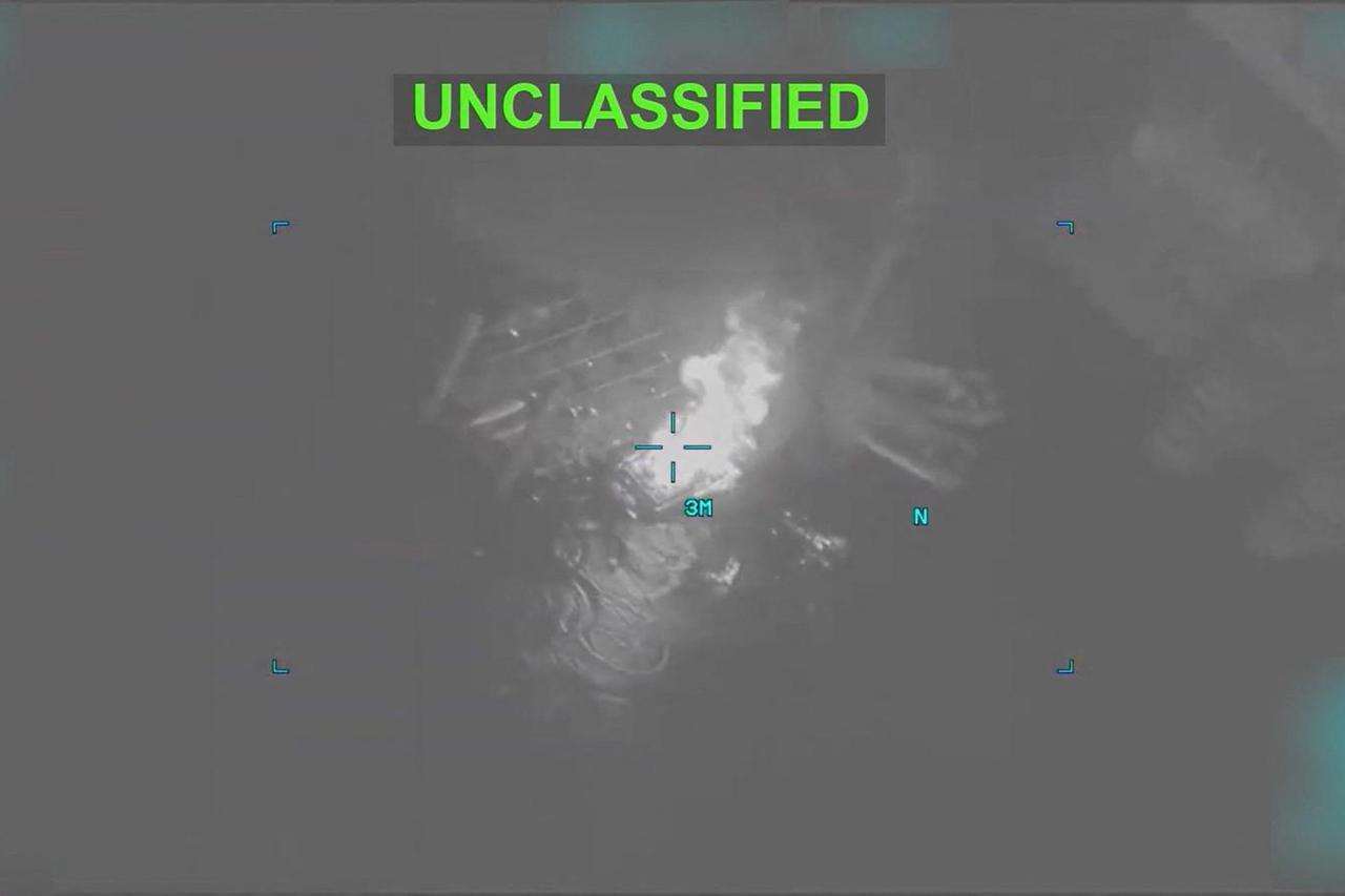 A boat is ablaze, at an unknown location, following during what the U.S. Central Command (CENTCOM) says are strikes on Iran