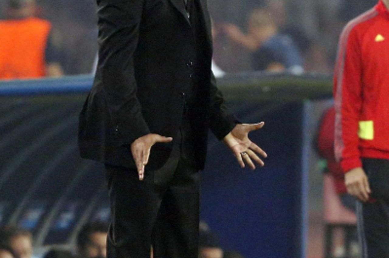 'Borussia Dortmund\'s coach Jurgen Klopp reacts during their Champions League Group F soccer match against Napoli at San Paolo stadium in Naples September 18, 2013. REUTERS/Stefano Rellandini (ITALY -