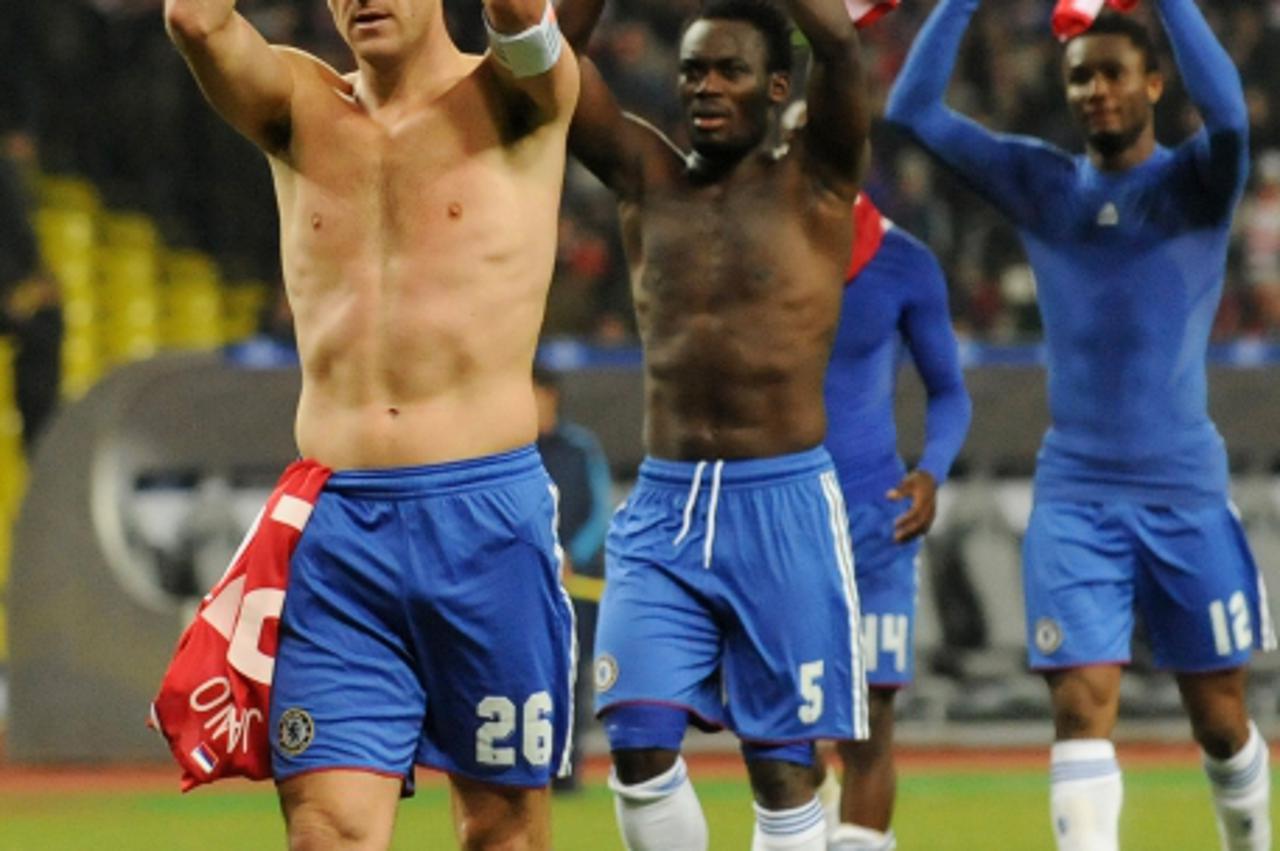 'Chelsea\'s captain John Terry (L) celebrates with his teammates the victory over Spartak Moscow on October 19, 2010 in Moscow during their  UEFA Champions League group F game.  Chelsea won  2-0.  AFP