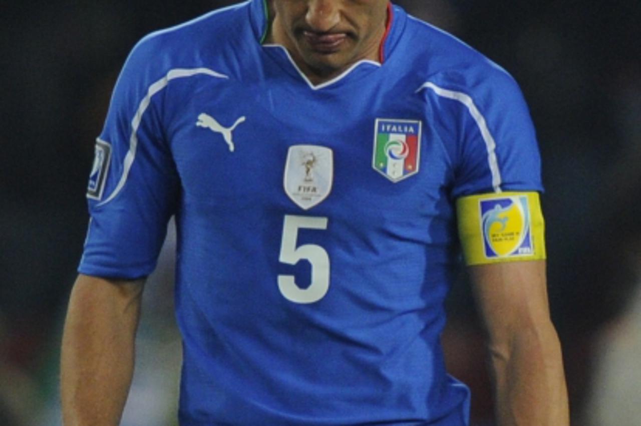 'Italy\'s defender Fabio Cannavaro reacts after Slovakia\'s striker Robert Vittek (unseen) scored a goal during their Group F first round 2010 World Cup football match on June 24, 2010 at Ellis Park s