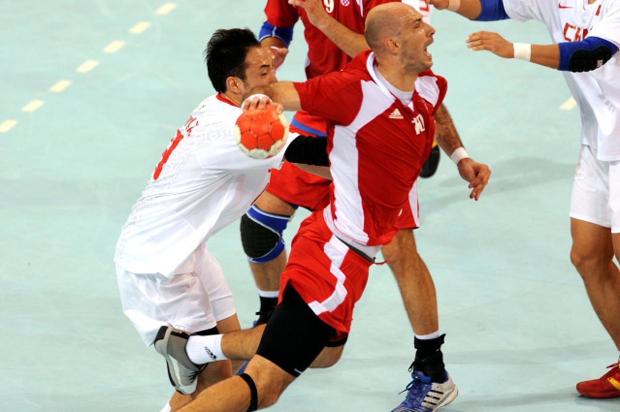 '18.08.2008 Peking - Hrvatska rukometna reprezentacija u susretu 5. kola B skupine olimpijskog turnira u Pekingu pobjedila je reprezentaciju Kine 33:22 i tako si osigurala plasman u cetvrtfinale. Davo