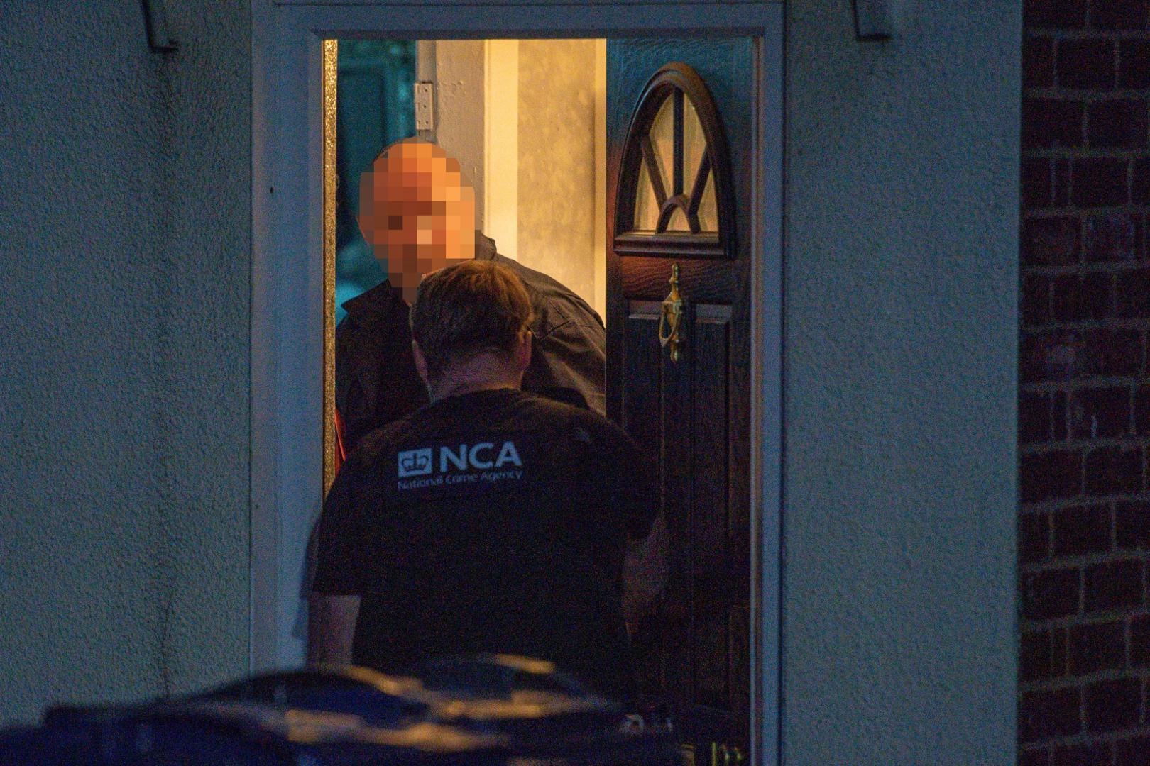 NCA raid Birmingham IMAGE PIXELATED BY PA PICTURE DESK The National Crime Agency and police take part in raid on a property in Birmingham on 26/06/20 in relation to an investigation on Encrochat, a military-grade encrypted communication system used by organised criminals trading in drugs and guns. Up to June 16, officers in the UK had arrested 307 suspects, of whom 69 had been charged, recovered 106 Encrochat devices and seized more than GBP 36 million and 916,000 euro (GBP 826,000) in cash. Jacob King  Photo: PA Images/PIXSELL