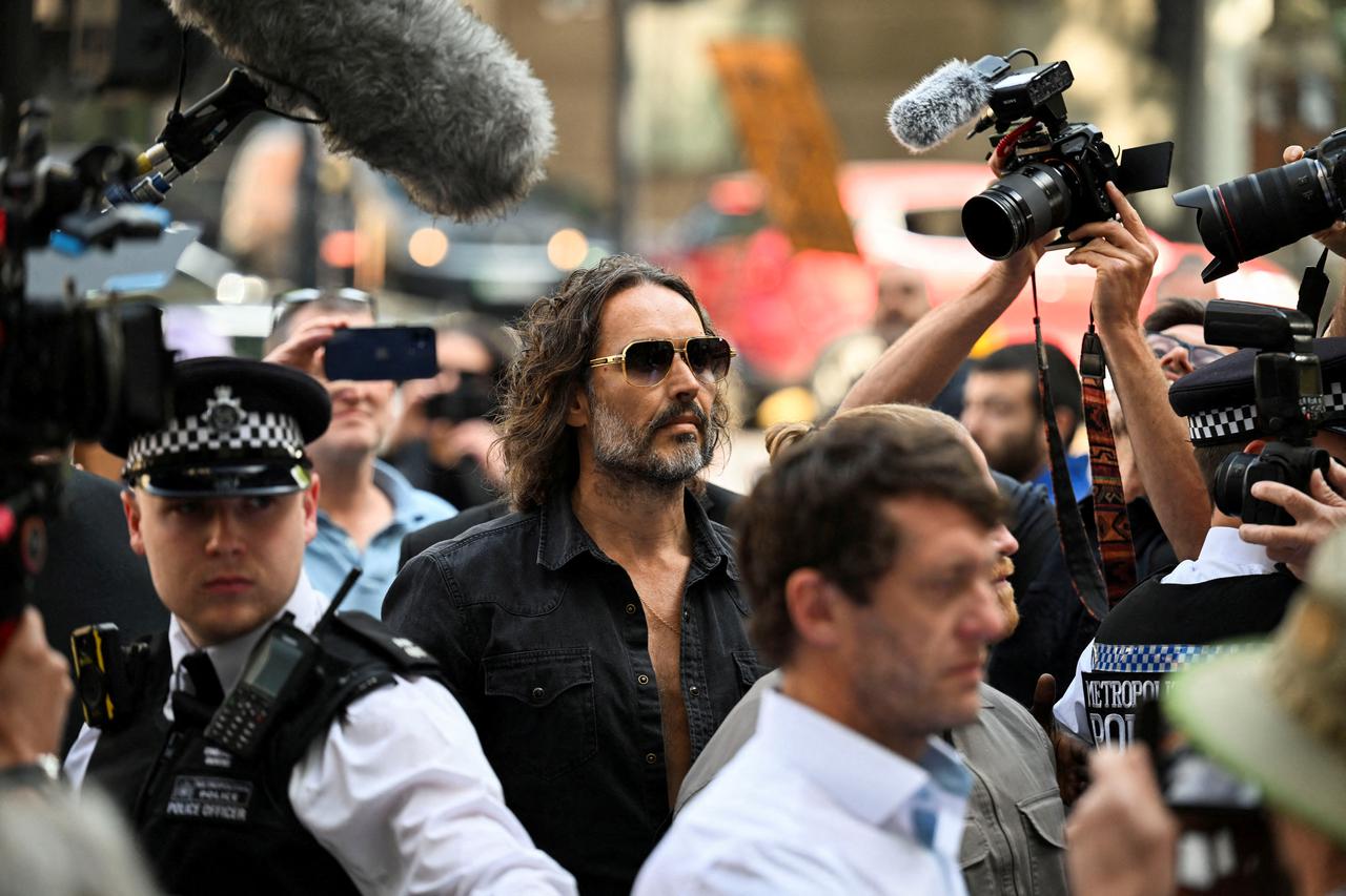 British actor and comedian Russell Brand appears at Westminster Magistrates' Court, in London
