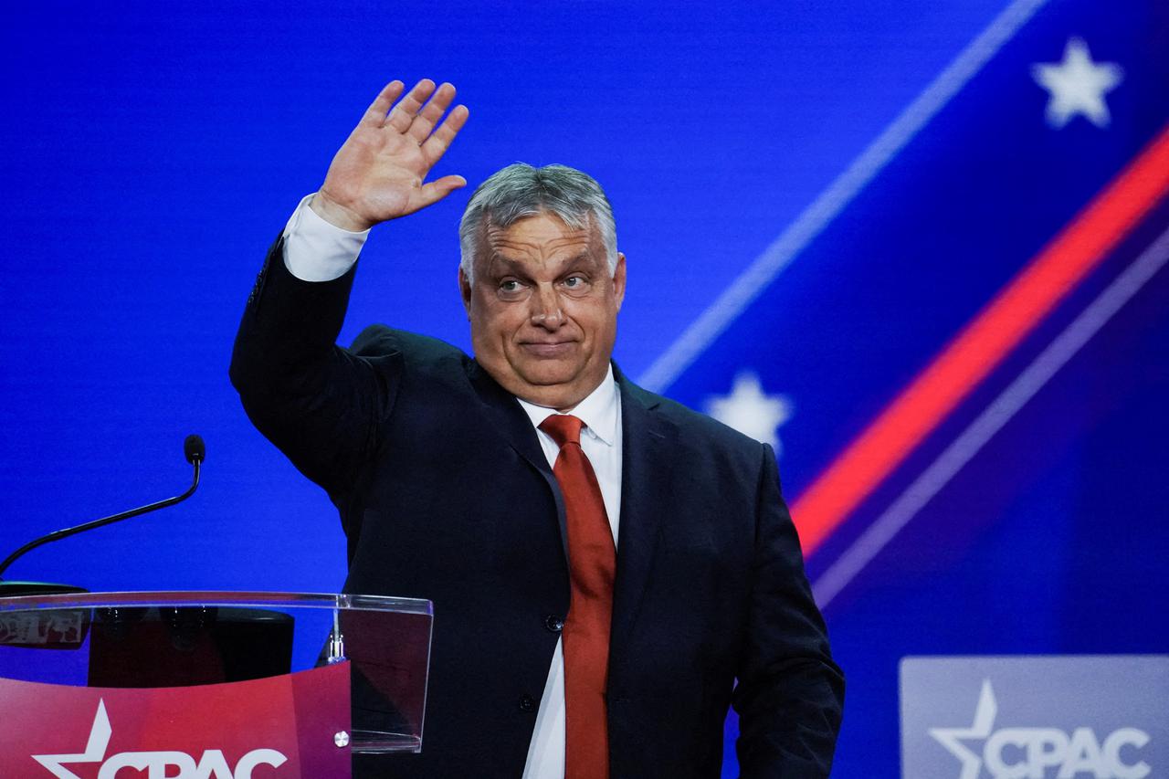 FILE PHOTO: Prime Minister of Hungary Viktor Orban waves at the audience during general session at the Conservative Political Action Conference (CPAC) in Dallas, Texas, U.S., August 4, 2022