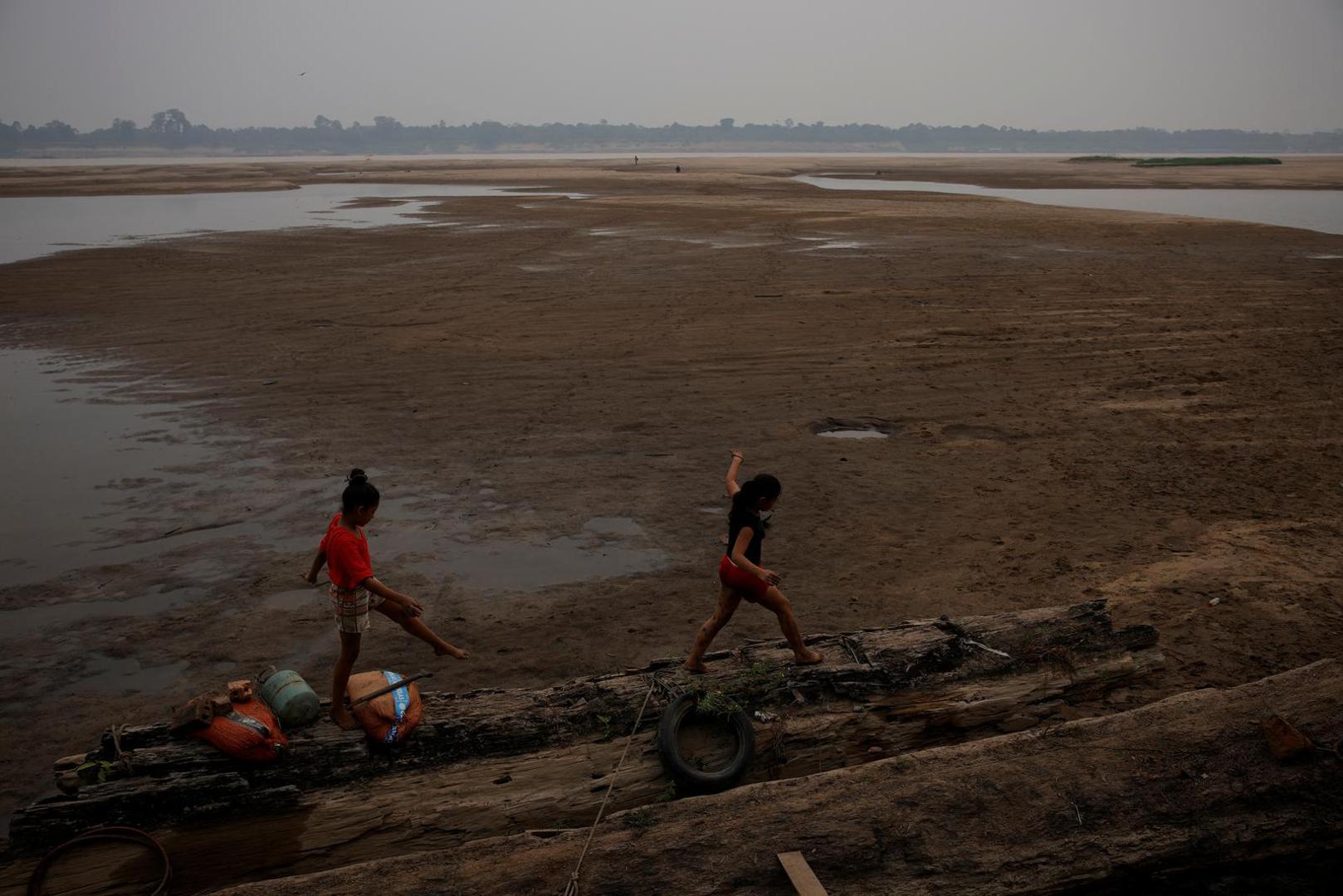 Children play on the sandbanks of the Madeira river, during the worst drought of the river in history, in Humaita, Amazonas state, Brazil, September 7, 2024. REUTERS/Bruno Kelly Photo: BRUNO KELLY/REUTERS