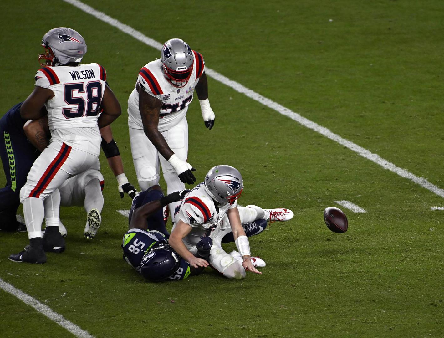 New England Patriots quarterback Drake Maye (10) fumbles the ball after being hit by Seattle Seahawks linebacker Derick Hall (58) during the NFL Super Bowl 60 LX football game between the New England Patriots and the Seattle Seahawks in Santa Clara, CA on Feb 8, 2026 Charles Baus/CSM.(Credit Image: Â Charles Baus/Cal Sport Media) Photo via Newscom Photo: Charles Baus/NEWSCOM