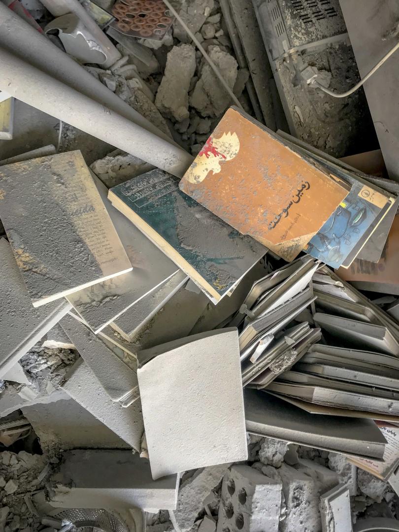 A woman looks out of a house extensively damaged across a targeted residential building in Tehran, Iran, on June 13, 2025. Photo by Saba/Middle East Images/ABACAPRESS.COM Photo: Middle East Images/ABACA/ABACA