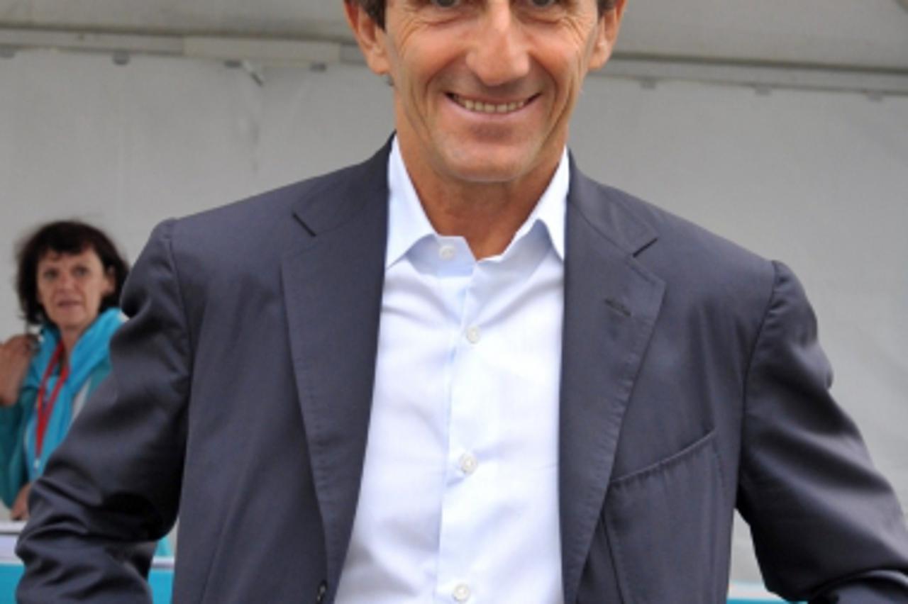 'Former Formula One champion Alain Prost smiles upon arrival at the French employers\' Medef organisation summer meeting on September 2, 2009 in Jouy-en-Josas, near Paris.  AFP  PHOTO   ERIC PIERMONT'