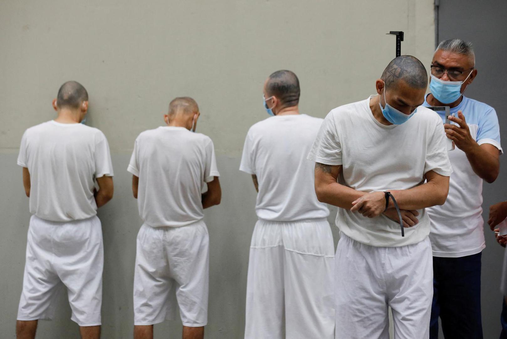 An inmate is attended by health personnel, during a tour in the "Terrorism Confinement Center" (CECOT) complex, which according to El Salvador's President, Nayib Bukele, is designed to hold 40,000 inmates, in Tecoluca, El Salvador October 12, 2023. REUTERS/Jose Cabezas Photo: Jose CABEZAS/REUTERS