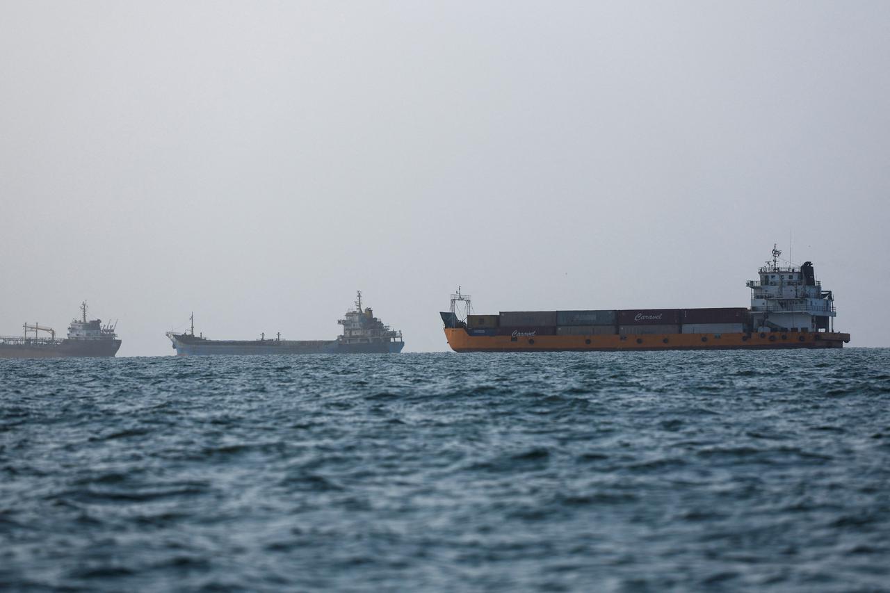 Vessels in the Strait of Hormuz are visible near the beach of Bandar Abbas