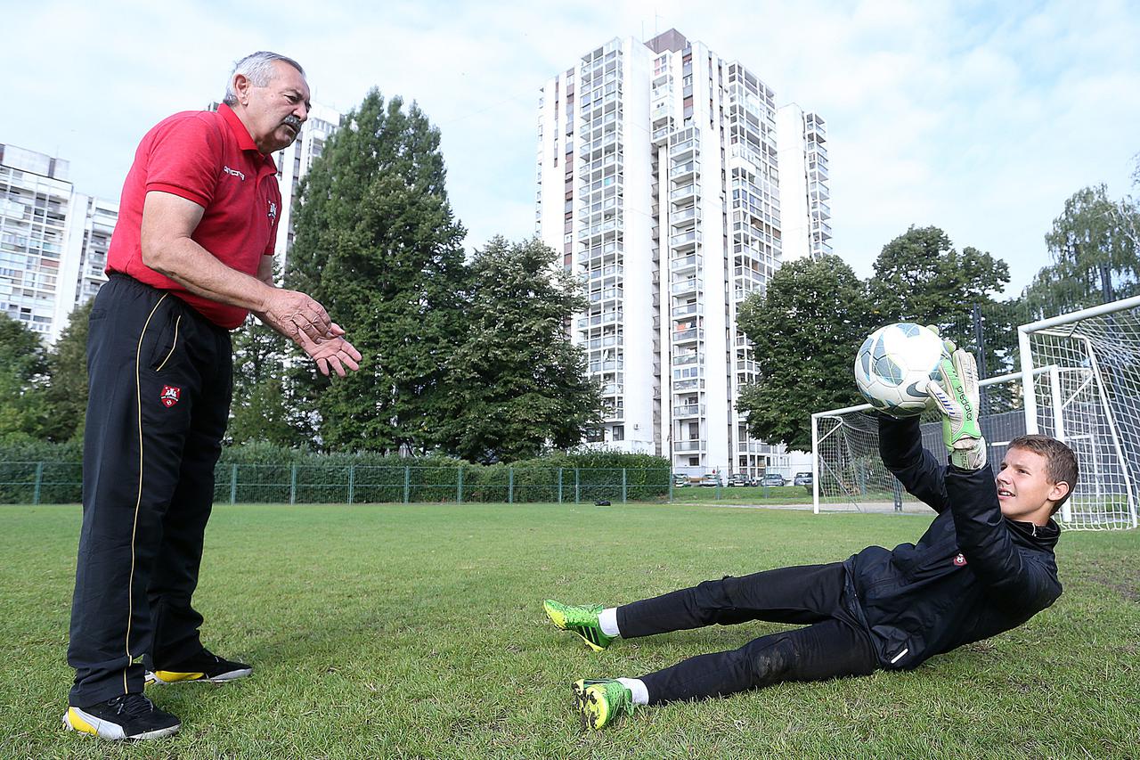 04.09.2013., Zagreb - Djecak Karlo Ziger, golman NK Zagreb koji ide u Chelsea. Karlo s trenerom Zeljkom Njezicem.  Photo: Goran Stanzl/PIXSELL