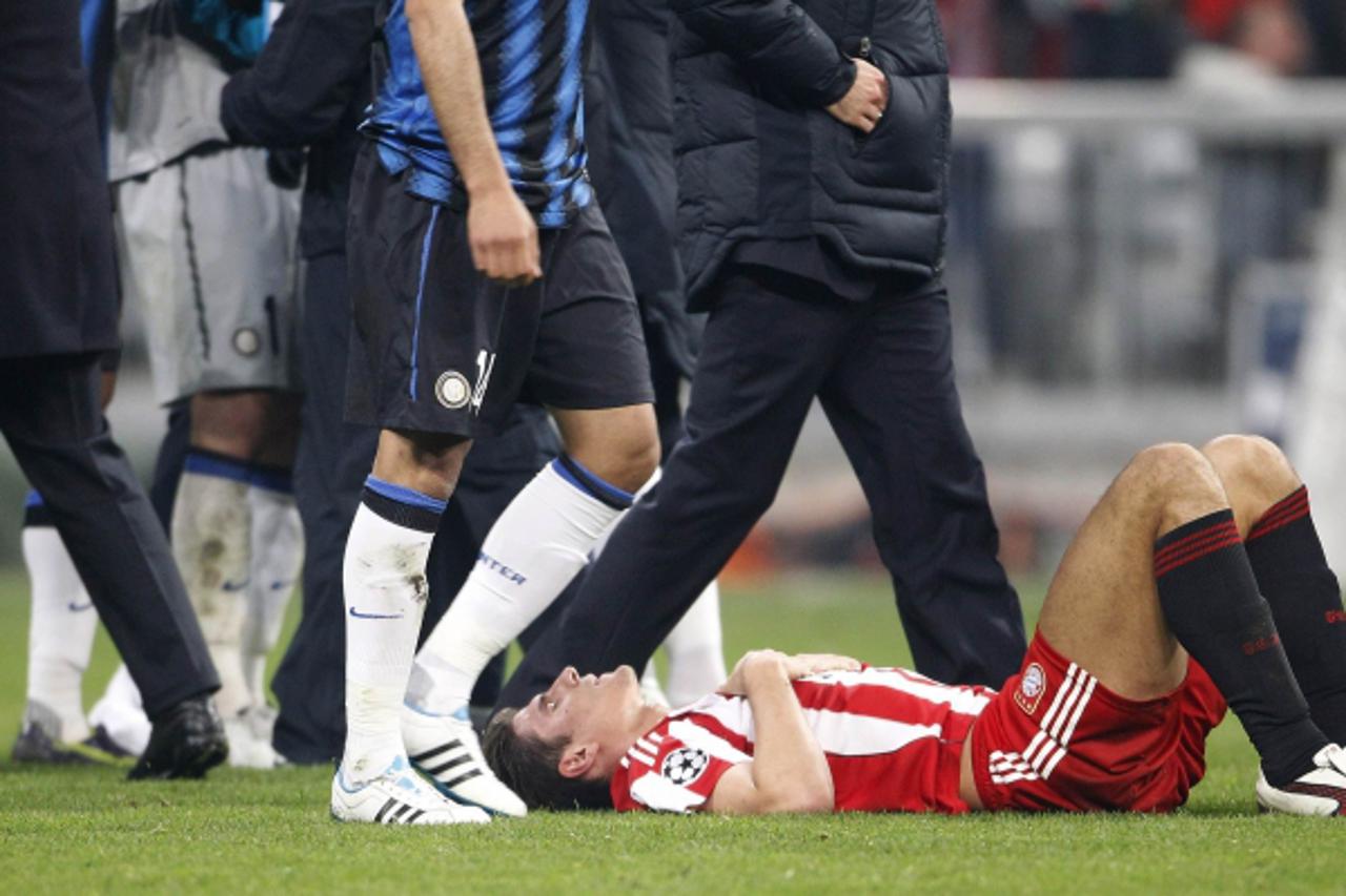 'Bayern Munich\'s Mario Gomez reacts after the second leg round of sixteen Champions League soccer match against Inter Milan in Munich March 15, 2011. REUTERS/Michaela Rehle  (GERMANY - Tags: SPORT SO