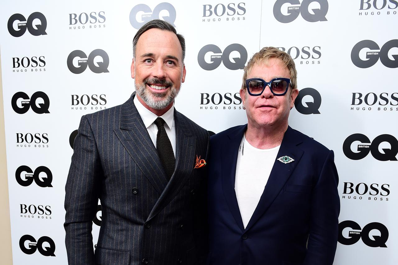 GQ Men of the Year Awards 2015 - London*EMBARGOED until 22:30 on the 8th September* Elton John and David Furnish (left) at the 2015 GQ Men of the Year Awards at the Royal Opera House, London. PRESS ASSOCIATION Photo. Picture date: Tuesday September 8, 201