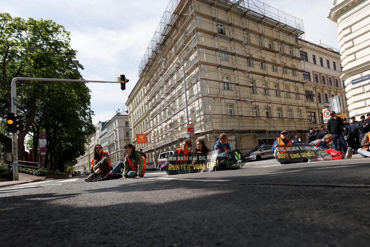 Climate activists stage a protest in Vienna