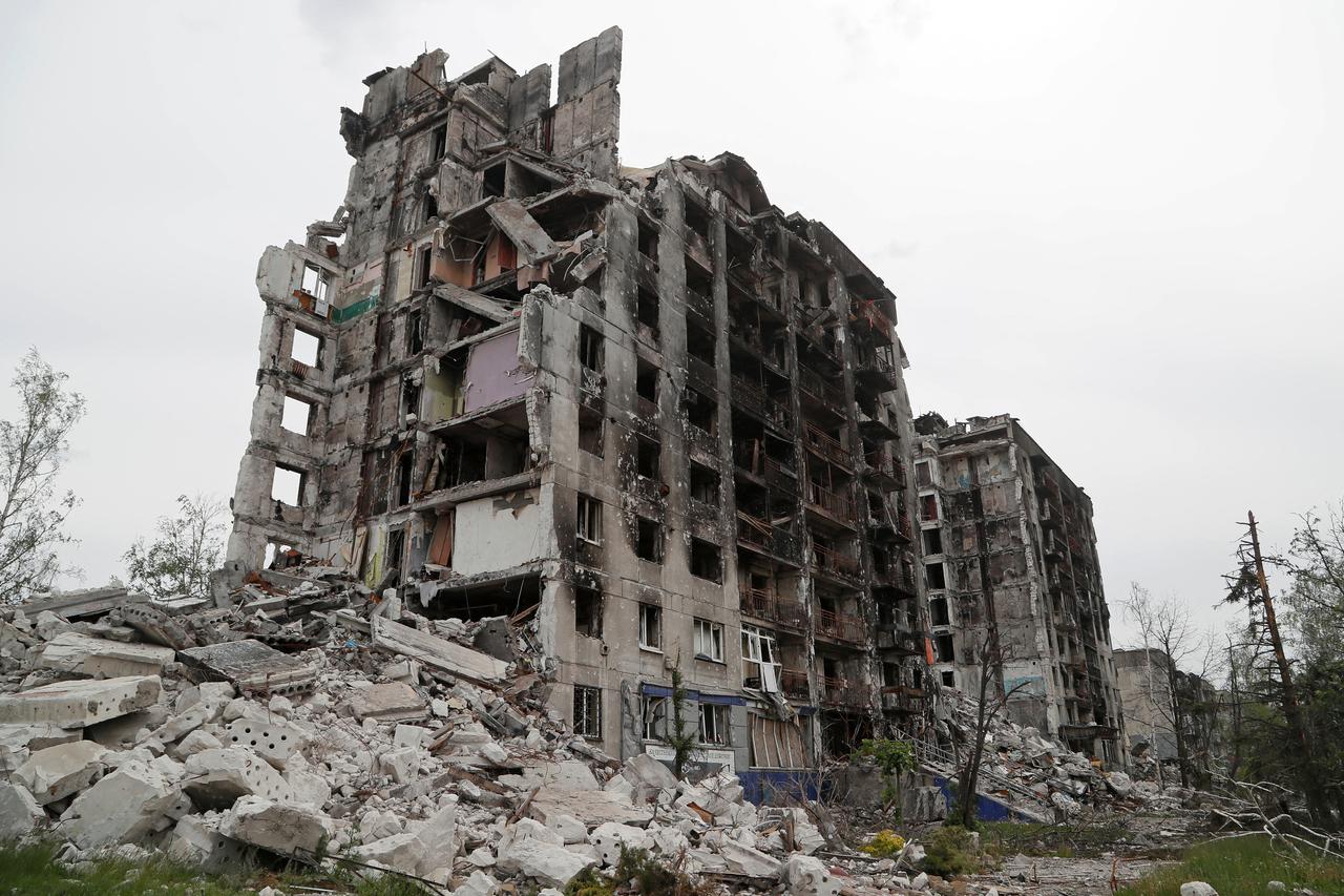 A view shows a destroyed residential building in Popasna