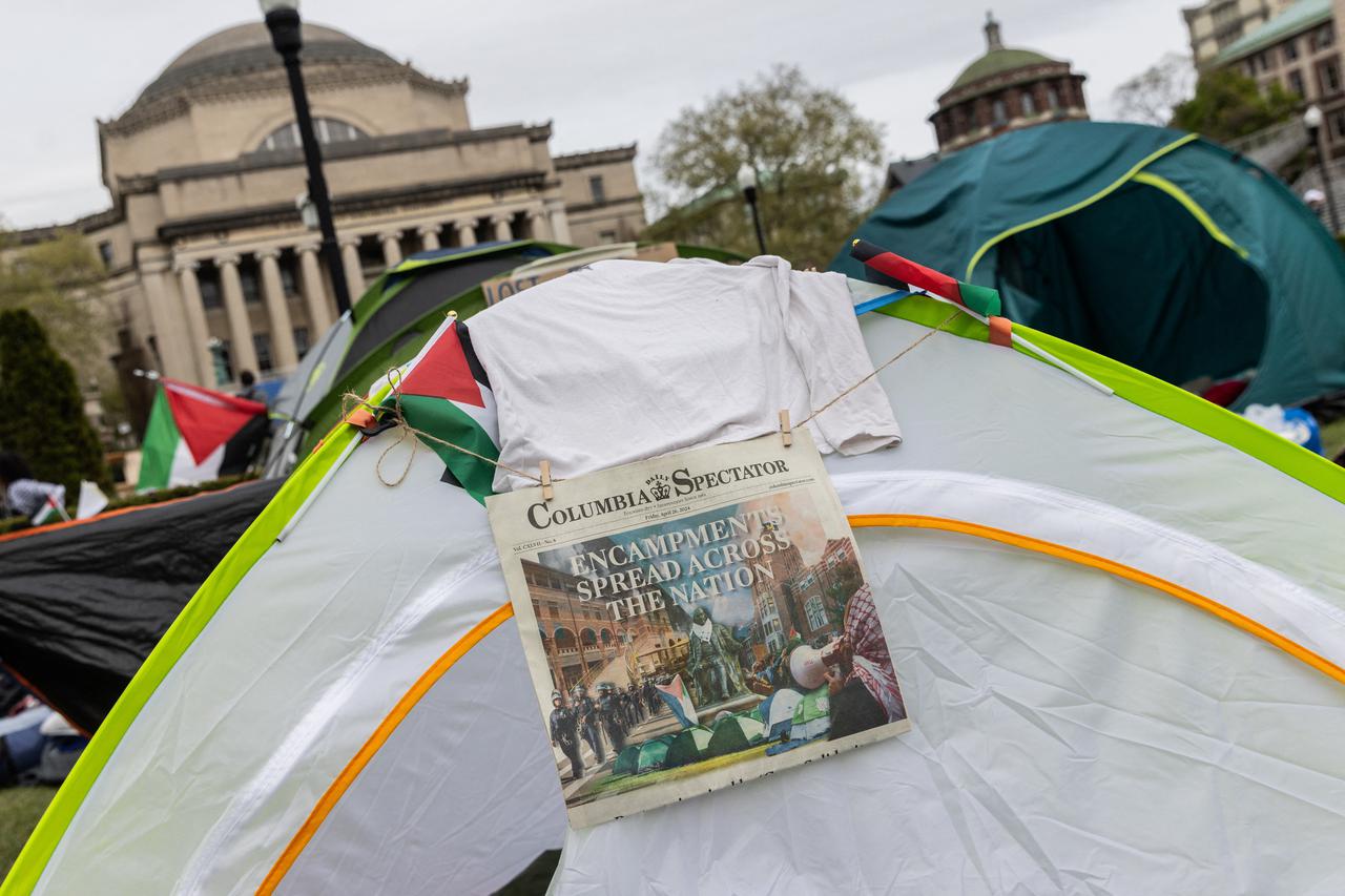 A newspapers hangs on a tent during a protest encampment in support of Palestinians on the Columbia University campus, during the ongoing conflict between Israel and the Palestinian Islamist group Hamas, in New York City