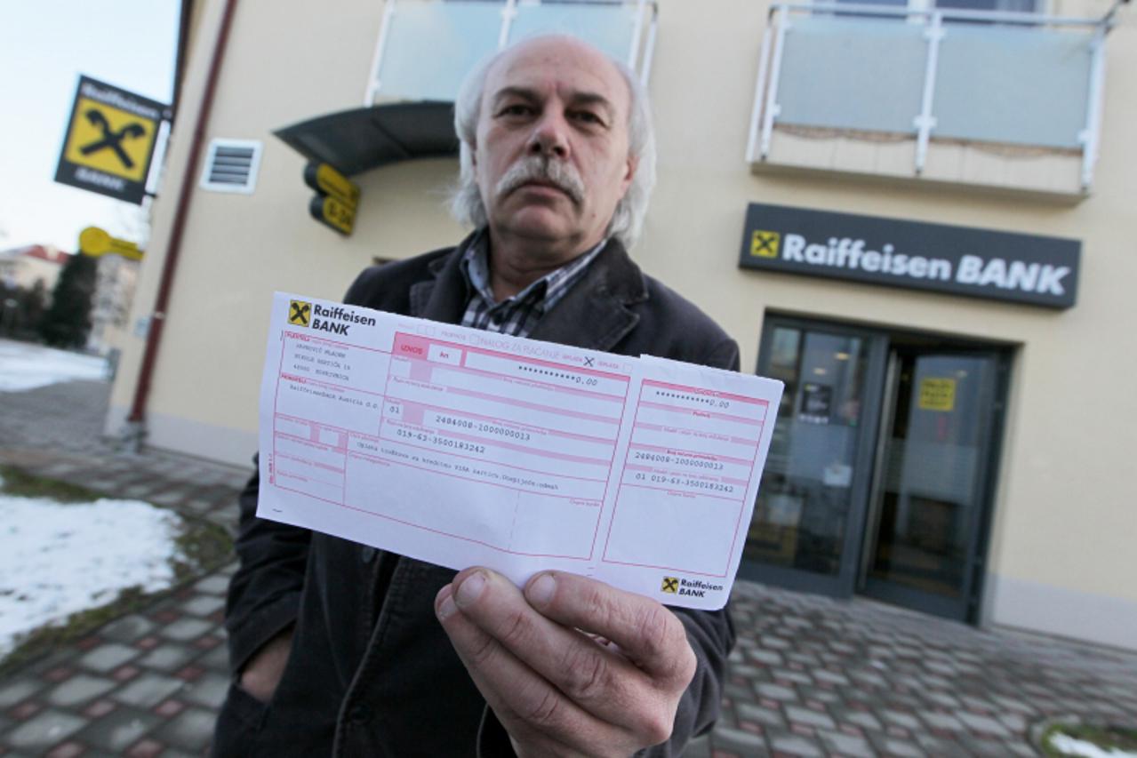 '24.01.2011., Koprivnica - Mladen Pavkovic je od Raiffeisen banke Austria dobio na 0,00 kuna duga koji mora podmiriti. Photo: Marijan Susenj/PIXSELL'