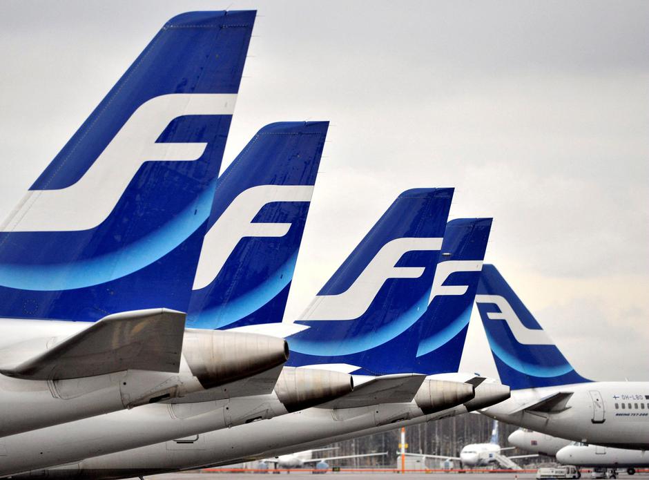 FILE PHOTO: Passenger planes of Finnish national airline company Finnair stand on the tarmac of Helsinki international airport