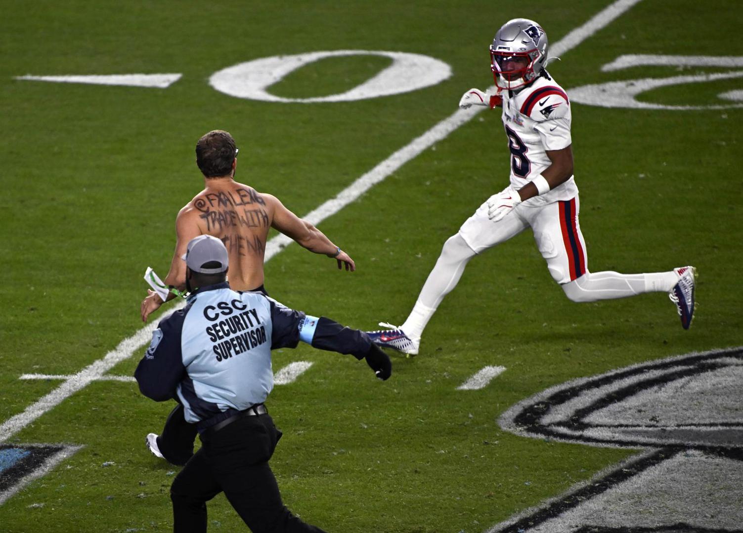 a fan runs onto the field during the NFL Super Bowl 60 LX football game between the New England Patriots and the Seattle Seahawks in Santa Clara, CA on Feb 8, 2026 Charles Baus/CSM.(Credit Image: Â Charles Baus/Cal Sport Media) Photo via Newscom Photo: Charles Baus/NEWSCOM