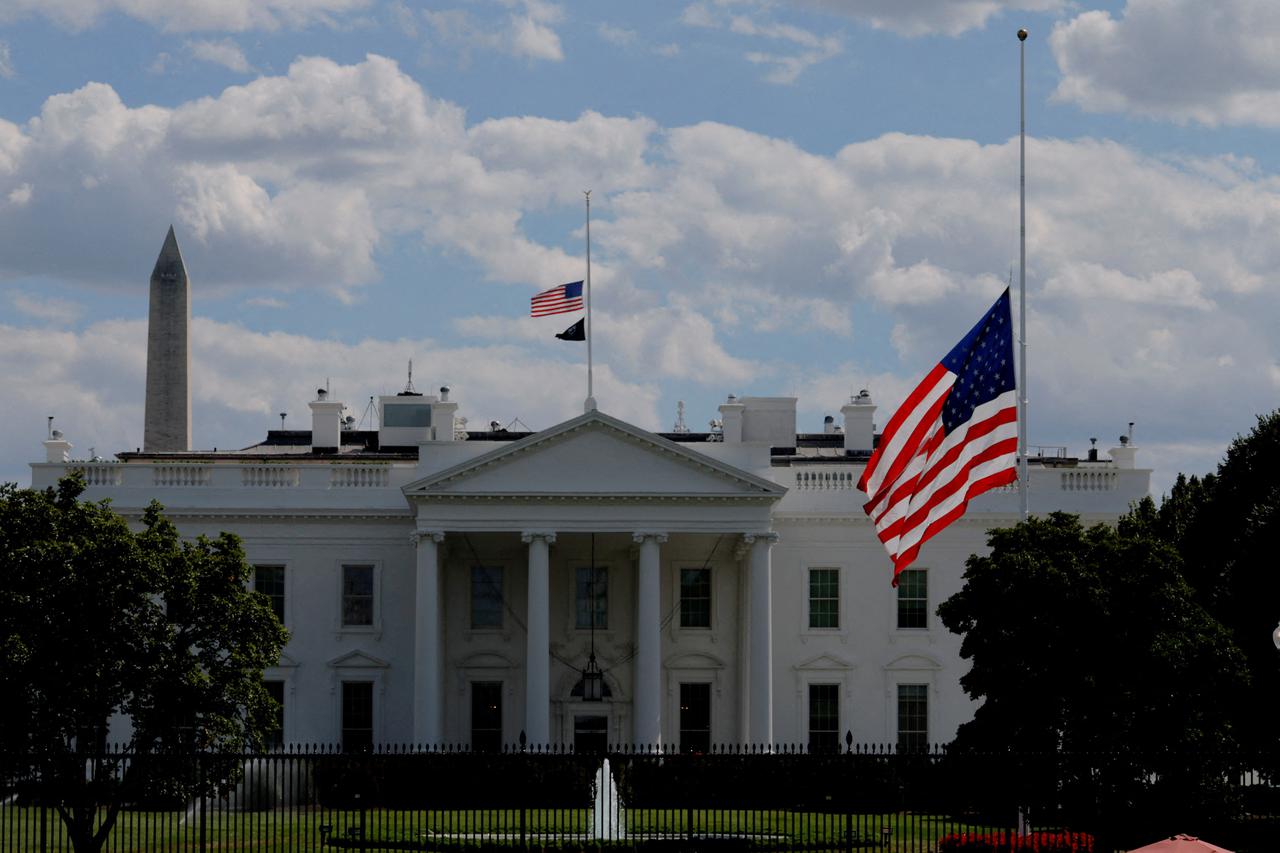 The flags at the White House fly at half staff in Washington