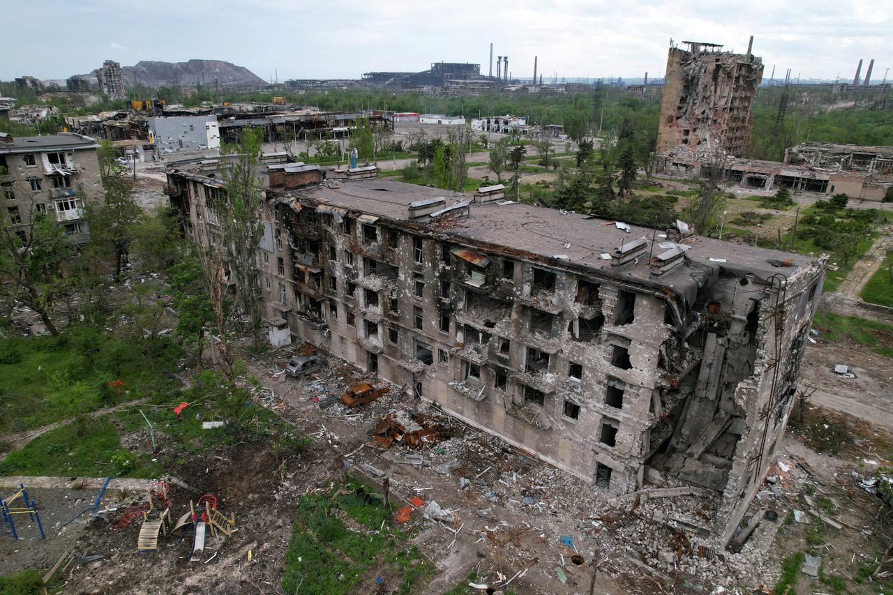 FILE PHOTO: A view shows a heavily damaged residential building in Mariupol