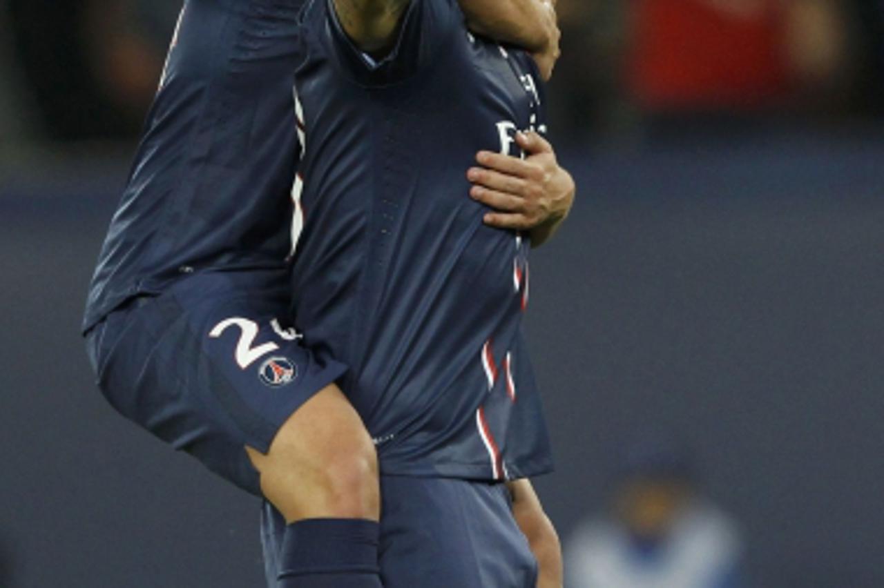 'Paris St Germain\'s Zlatan Ibrahimovic celebrates his first goal during their Champions League soccer match against Dynamo Kiev at the Parc des Princes stadium in Paris, September 18, 2012.         R