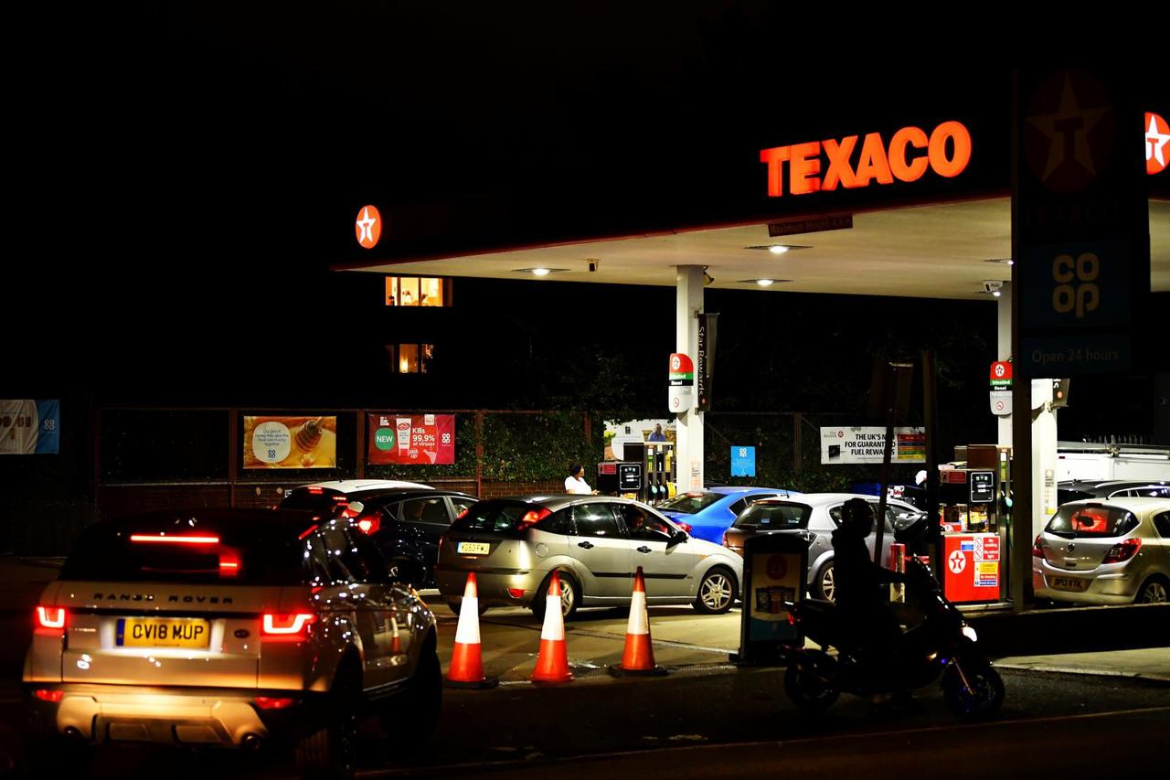 Vehicles queue to refill at a Texaco fuel station in south London