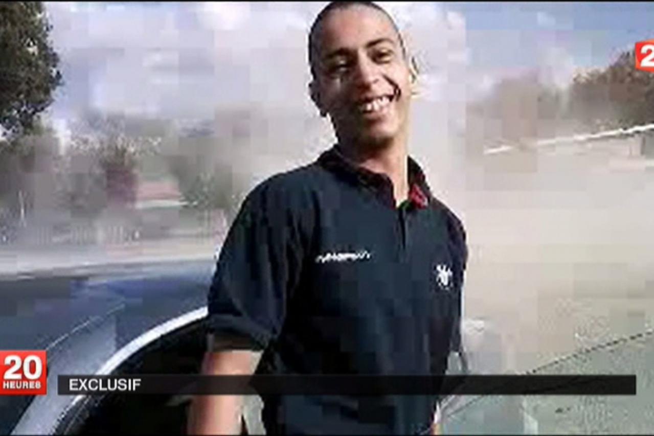 'An undated and non-datelined frame grab from a video broadcast March 21, 2012 by French national television station France 2 who they claim to show Mohamed Merah, the suspect in the killing of 3 para