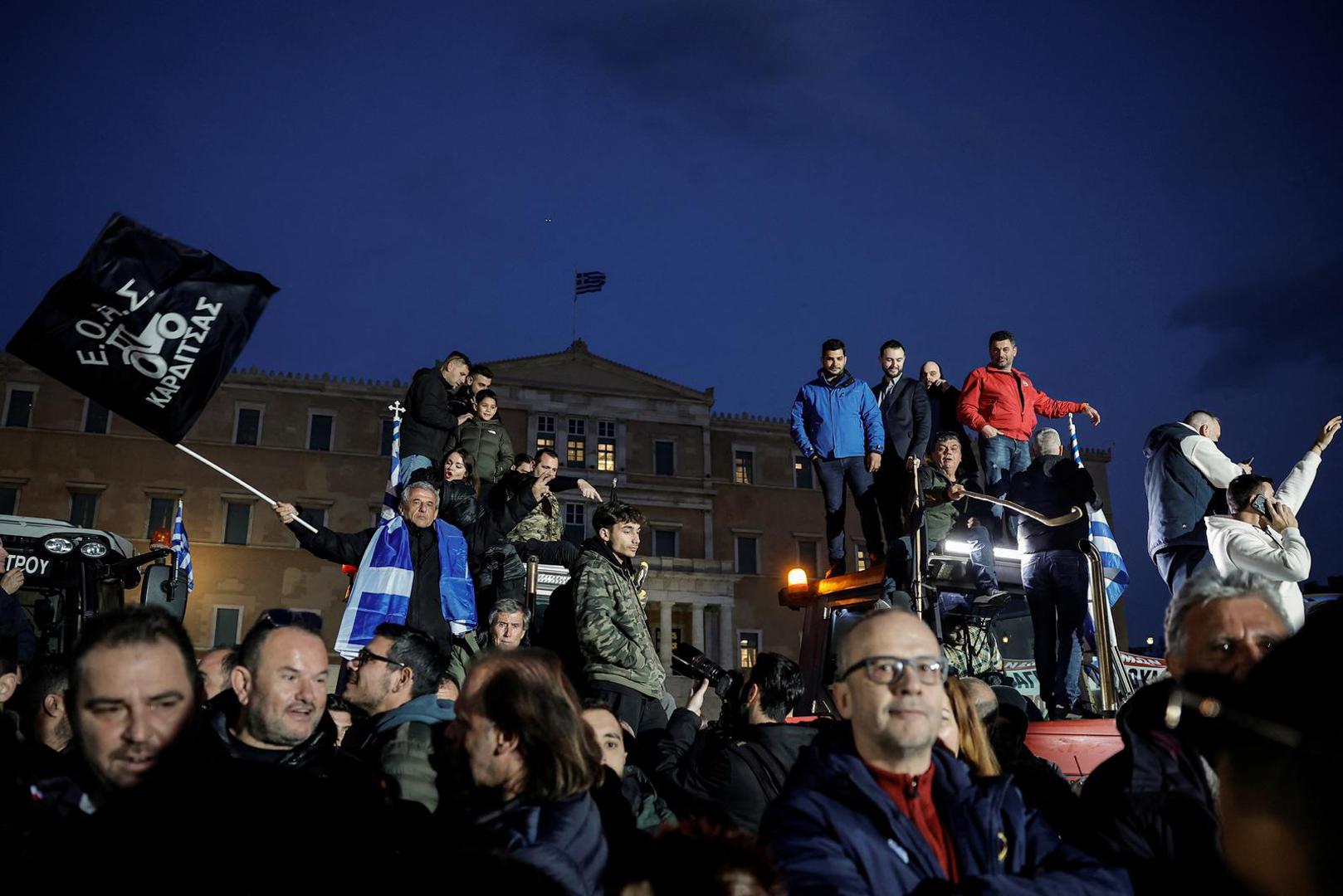 Greek farmers, with their tractors, protest in front of the Greek parliament over rising energy costs and competition from imports, in Athens, Greece, February 20, 2024. REUTERS/Louisa Gouliamaki Photo: LOUISA GOULIAMAKI/REUTERS