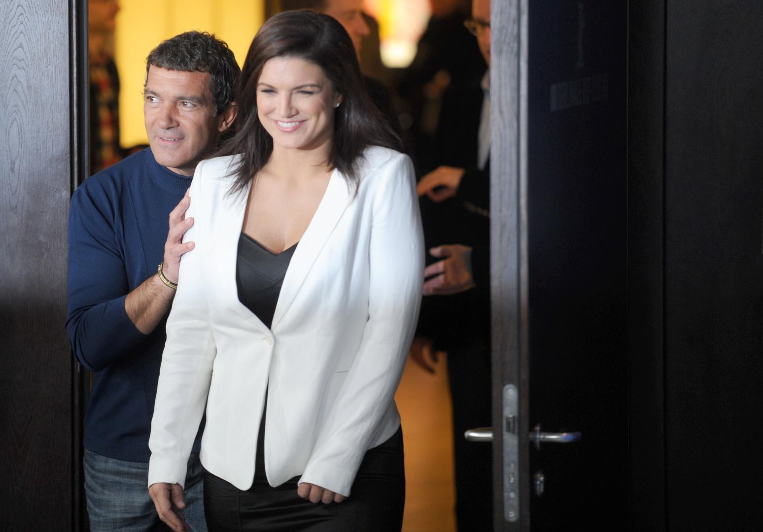US actress Gina Carano arrives with Spanish actor Antonio Banderas for the photocall of the movie 'Haywire' during the 62nd Berlin International Film Festival, in Berlin, Germany, 15 February 2012. The movie is presented in the section Competition Special Screening at the 62nd Berlinale running from 09 to 19 February. Photo: Joerg Carstensen/DPA/PIXSELL