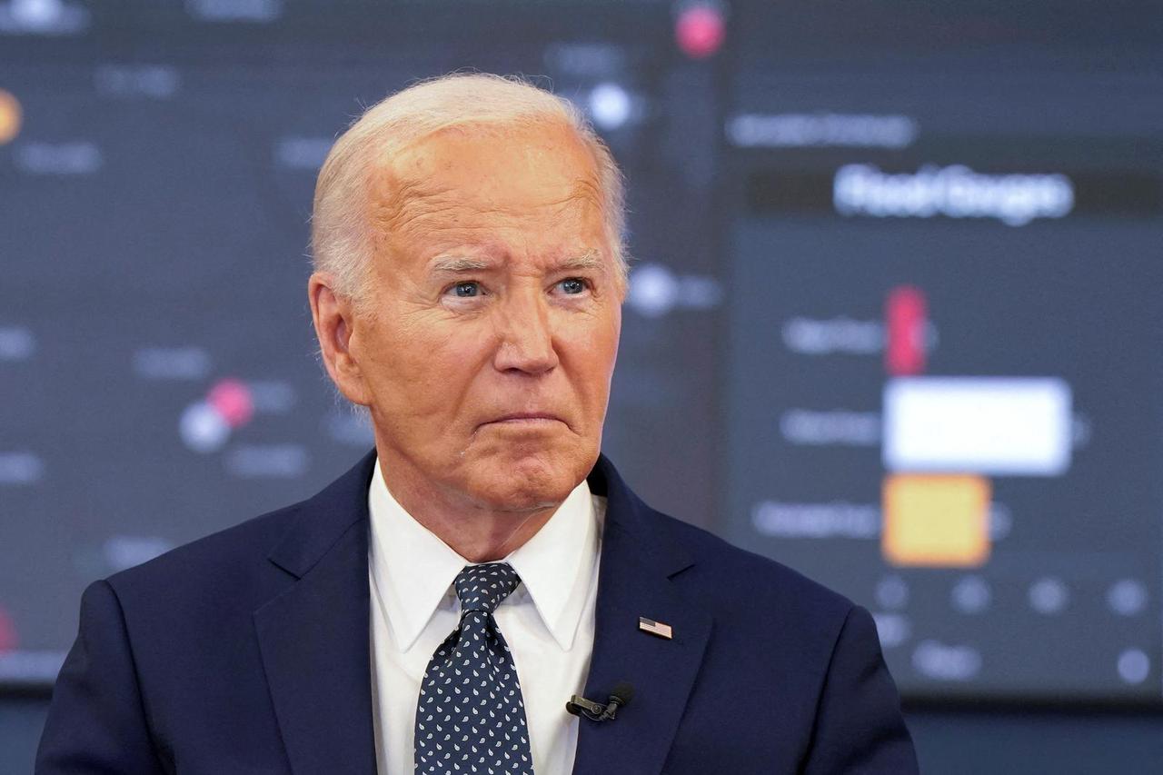 U.S. President Joe Biden receives a briefing from federal officials on extreme weather at the D.C. Emergency Operations Center in Washington