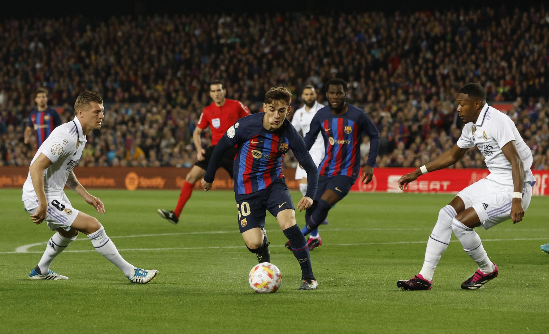 Soccer Football - Copa del Rey - Semi Final - Second Leg - FC Barcelona v Real Madrid - Camp Nou, Barcelona, Spain - April 5, 2023 FC Barcelona's Gavi in action with Real Madrid's David Alaba REUTERS/Albert Gea Photo: ALBERT GEA/REUTERS