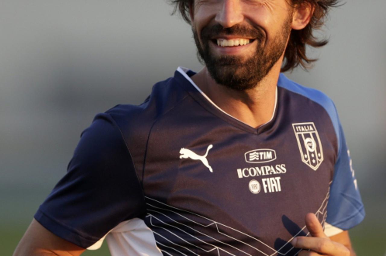 'Italy\'s national soccer team player Andrea Pirlo attends a training session during their preparation for the Confederations Cup 2013 in Rio de Janeiro June 10, 2013. REUTERS/Ricardo Moraes (BRAZIL -