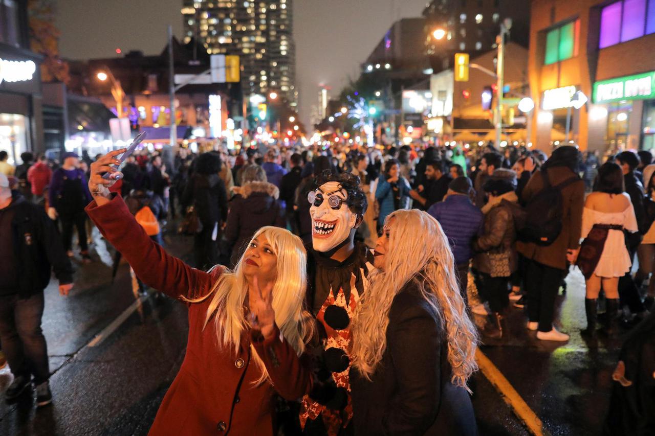 Revellers attend Church Street's annual Halloween party in Toronto