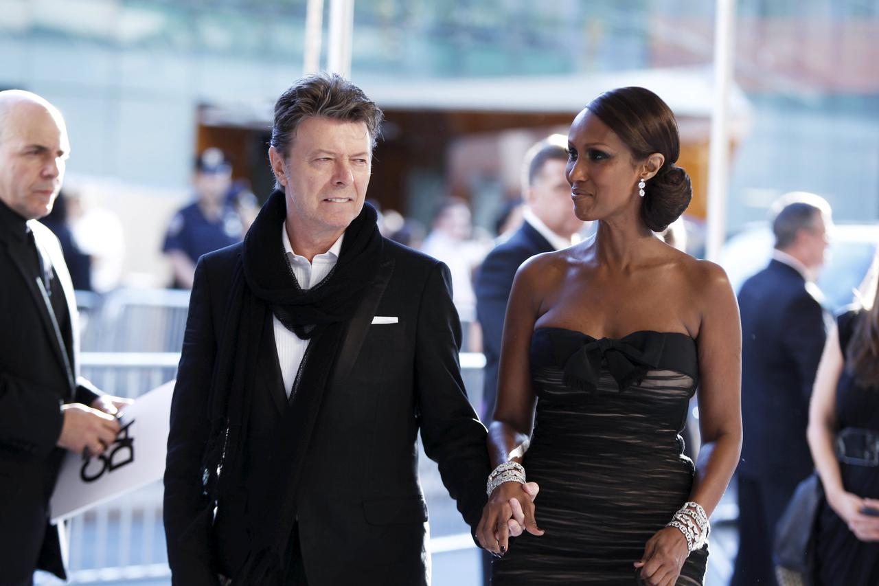 Singer David Bowie arrives with his wife Iman to attend the Council of Fashion Designers of America (CFDA) fashion awards in New York in this June 7, 2010 file photo. Singer Bowie has died after an 18-month battle with cancer, his official Twitter account