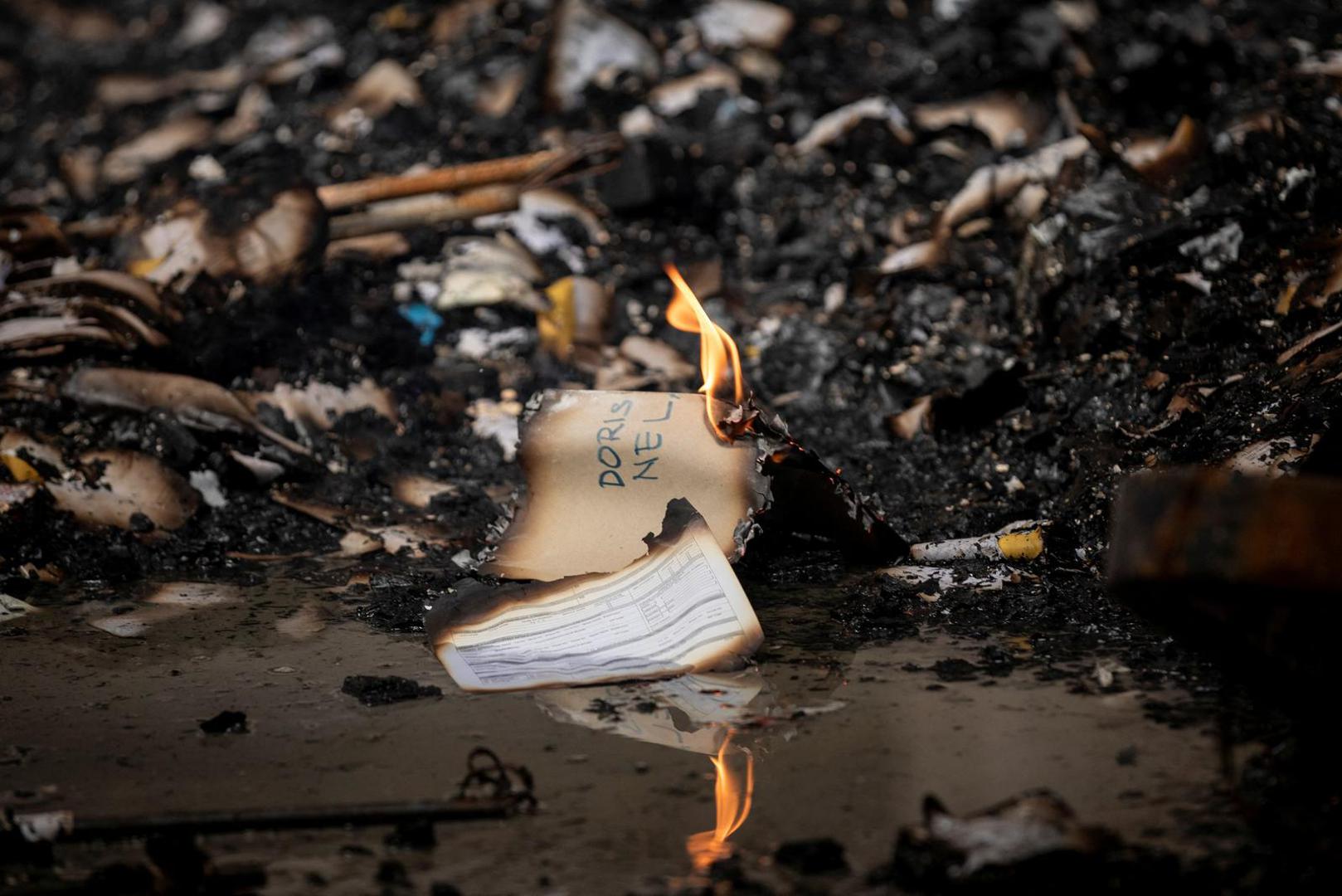 Papers are in flames inside the burning Manila Central Post Office building after a massive fire, in Manila, Philippines, May 22, 2023. REUTERS/Eloisa Lopez Photo: ELOISA LOPEZ/REUTERS