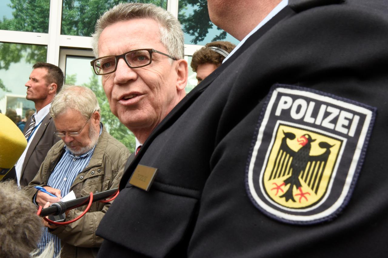 German Interior Minister Thomas de Maiziere is seen during his visit at the federal police inspection in Bremen, Germany, August 10, 2016.REUTERS/Fabian Bimmer