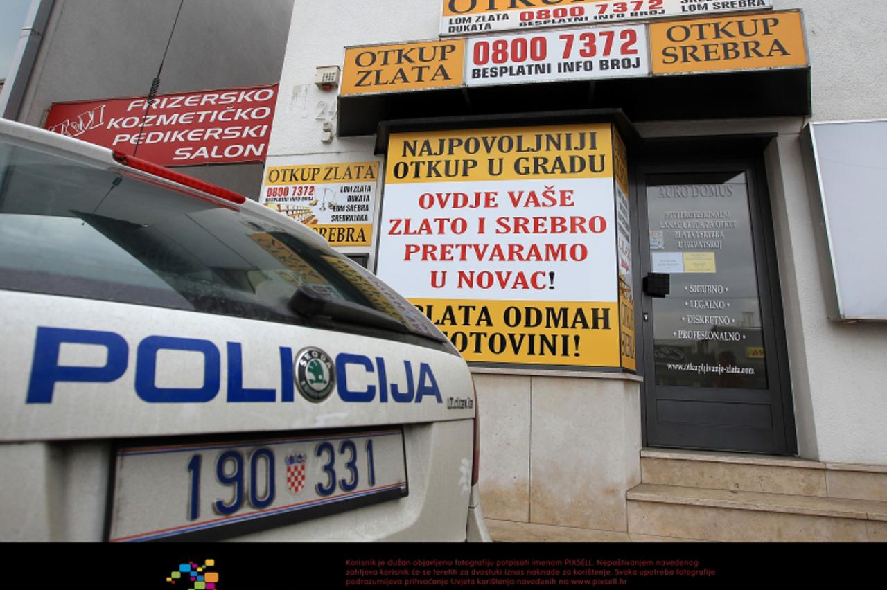 \'12.12.2011., Zagreb - Oruzana pljacka poslovnice za otkup zlata na aveniji Dubrava 24. Ocevid u tijeku. Photo: Antonio Bronic/PIXSELL\'