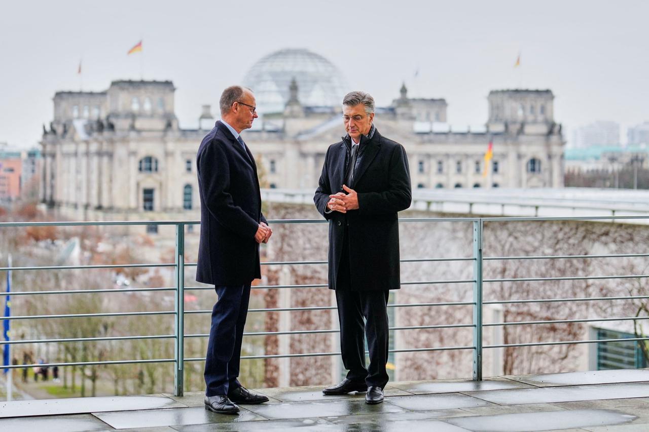 German Chancellor Merz speaks with Croatia's Prime Minister Plenkovic during their meeting at the Chancellery in Berlin