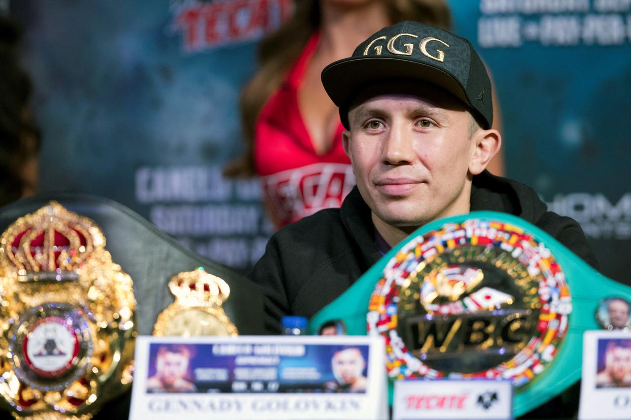 FILE PHOTO: Middleweight boxer Gennady Golovkin of Kazakhstan sits behind his belts during a news conference in Las Vegas
