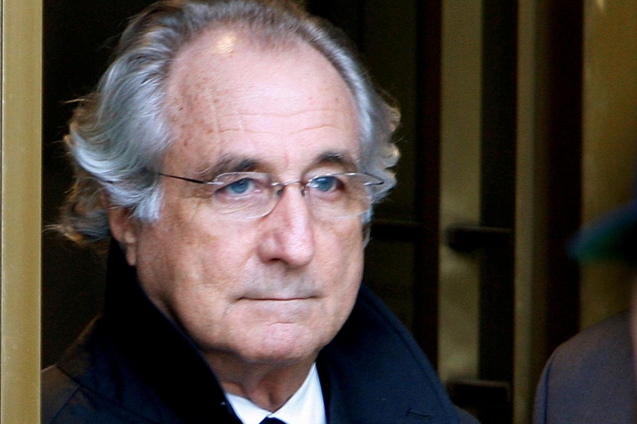 FILE PHOTO: Accused swindler Madoff exits the Manhattan federal court house in New York